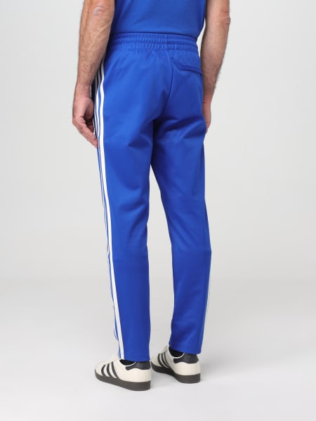 blue adidas trousers