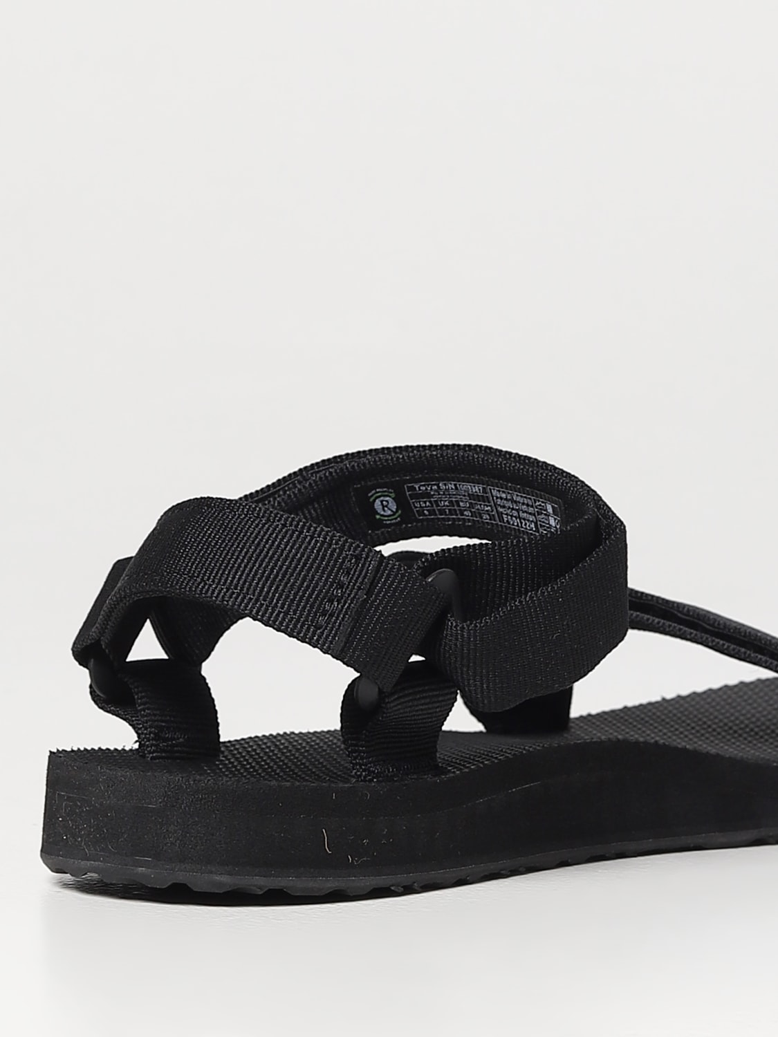 Teva black original on sale universal flat sandals