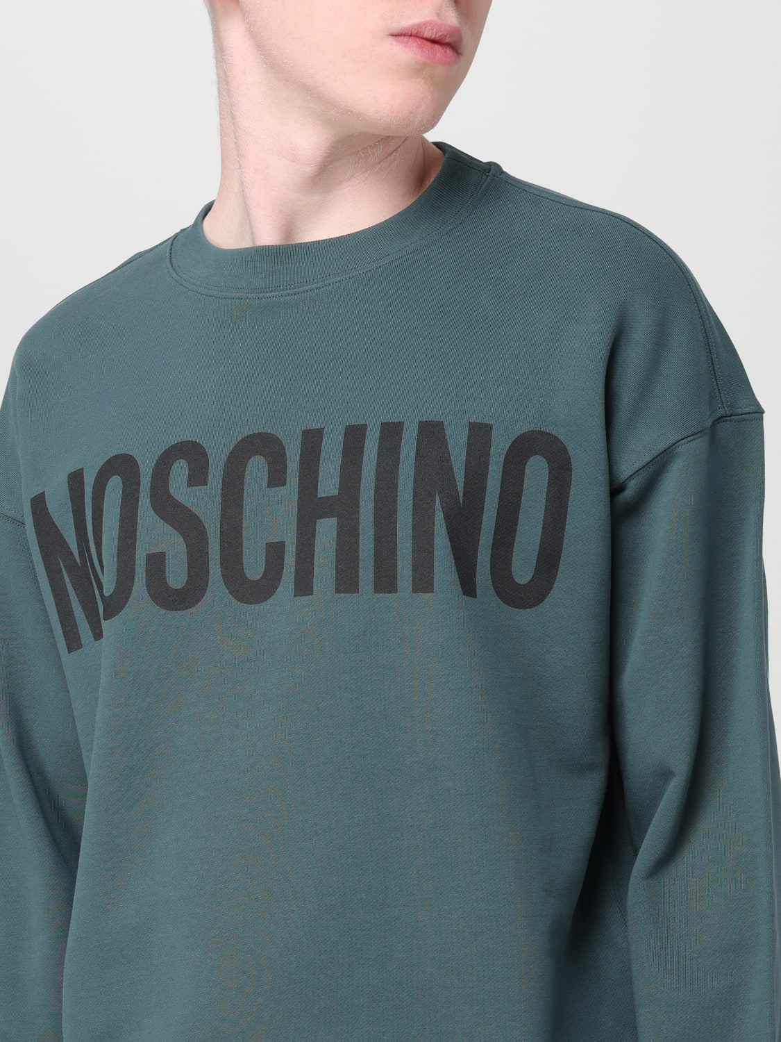 Moschino best sale green sweatshirt