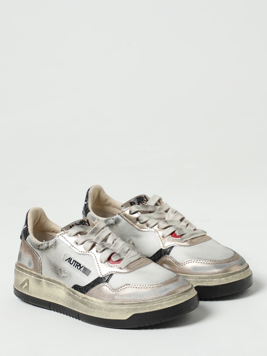 AUTRY: Super Vintage sneakers in used leather and mesh - White