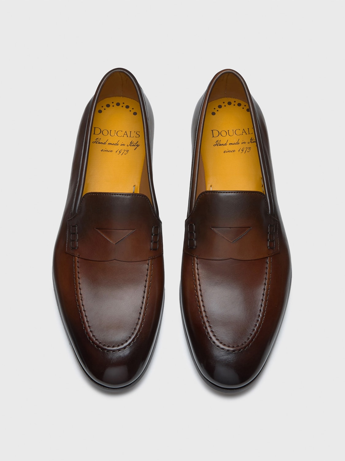Doucal's burnished-finish leather loafers - Brown
