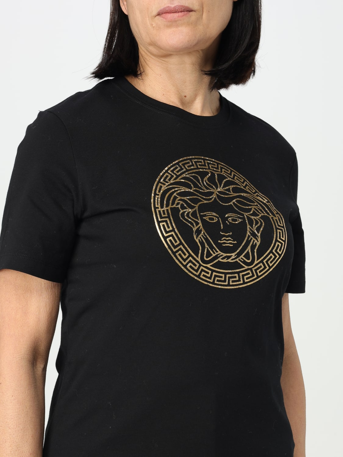 VERSACE：Tシャツ レディース - ブラック | GIGLIO.COMオンラインの