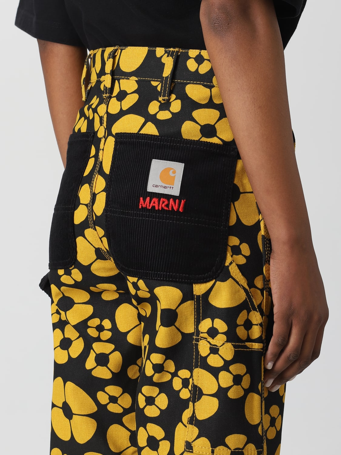 MARNI: Carhartt WIP pants in printed cotton - Yellow | Marni pants PAMA031293UTX001 online on GIGLIO.COM