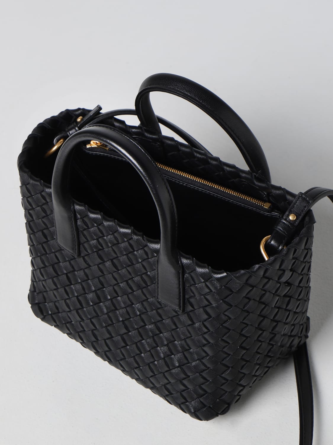 Bottega Veneta® Mini Handle in Black. Shop online now.