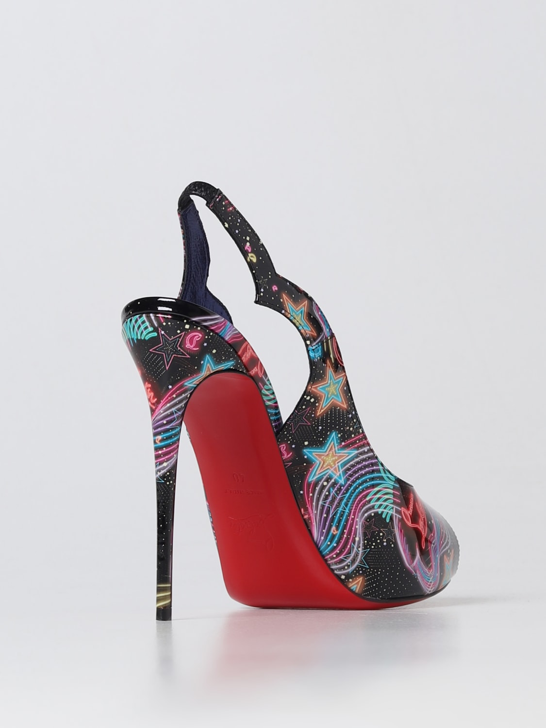 Hot Chick Christian Louboutin patent leather pumps