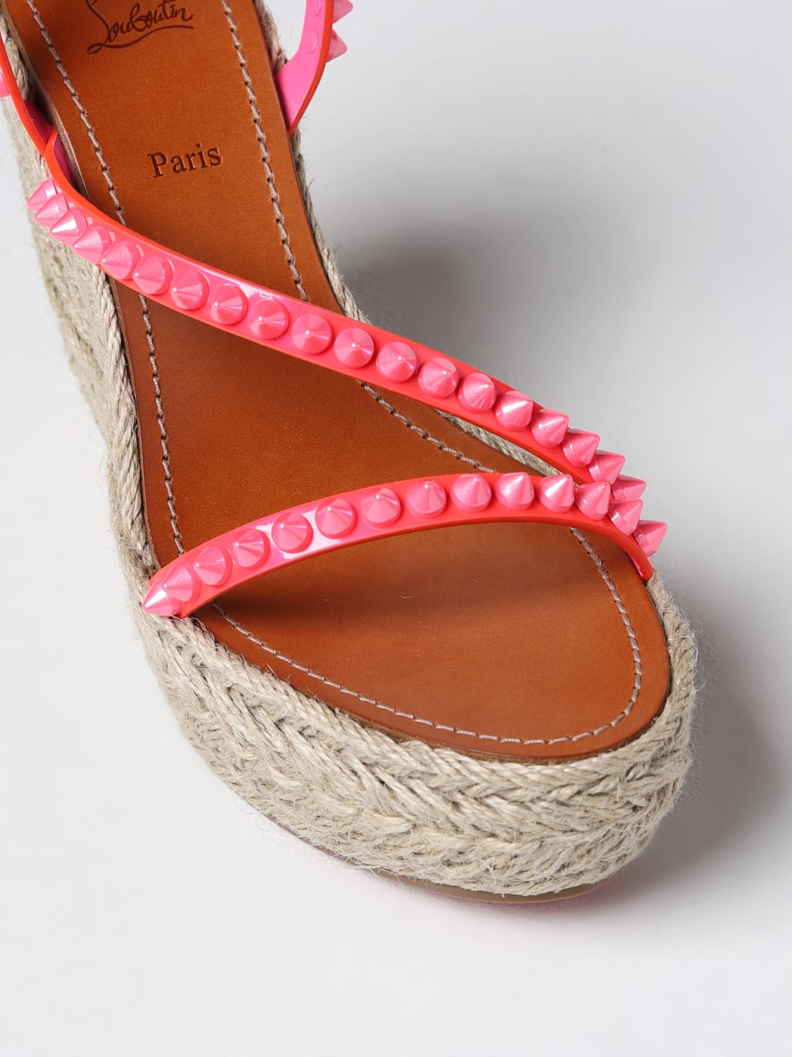 CHRISTIAN LOUBOUTIN: Mafaldina wedge sandal in patent leather studs - Fuchsia | Christian Louboutin wedge shoes 1230846 online at GIGLIO.COM