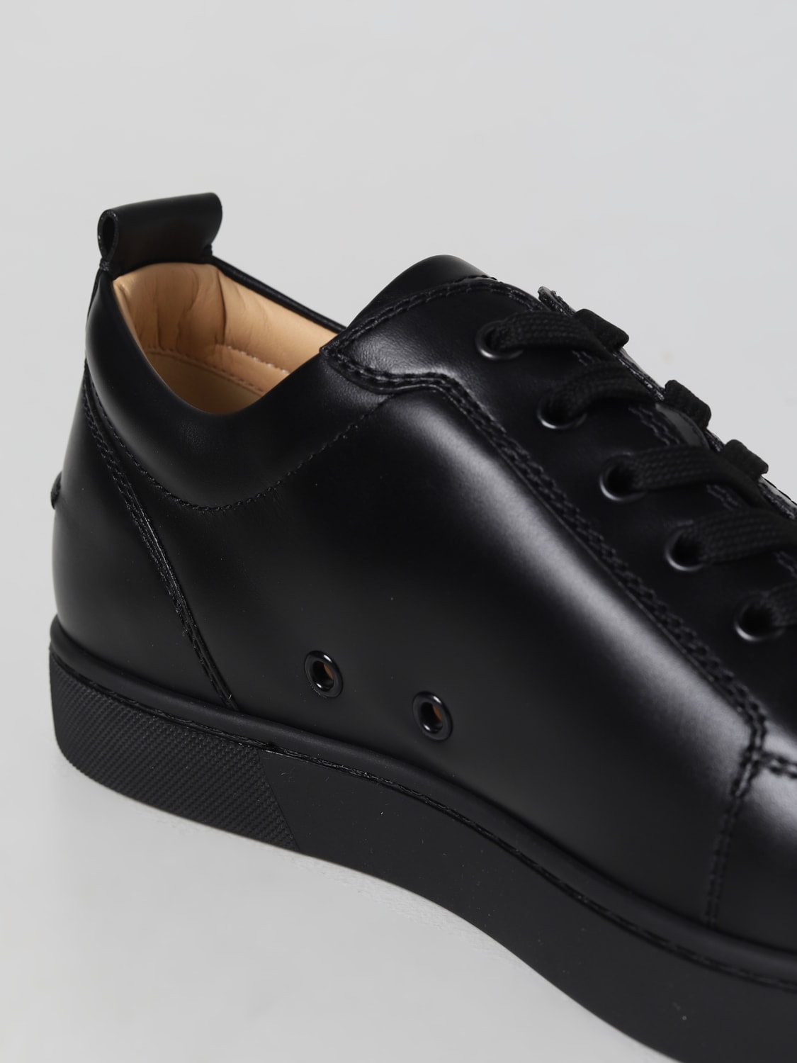 CHRISTIAN LOUBOUTIN: Louis Junior leather sneakers - Black | Christian sneakers online at GIGLIO.COM