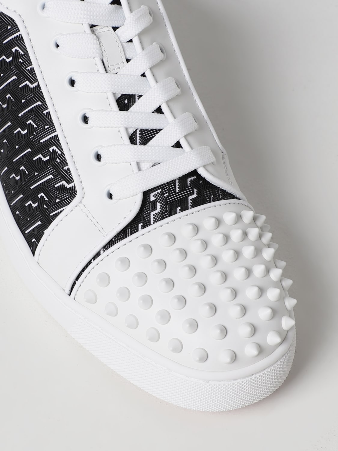 CHRISTIAN LOUBOUTIN: Louis Junior Spikes sneakers in leather with