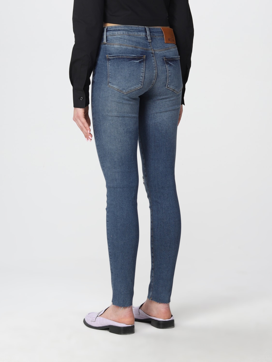 Love Outlet: jeans in washed denim with tears - Blue Love Moschino jeans online GIGLIO.COM