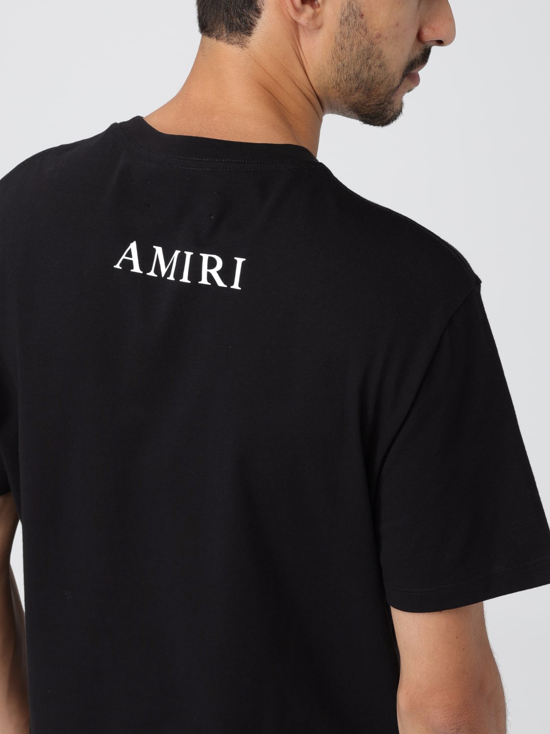 Amiri T Shirt For Man Black Amiri T Shirt Pf23mjl004 Online At Giglio
