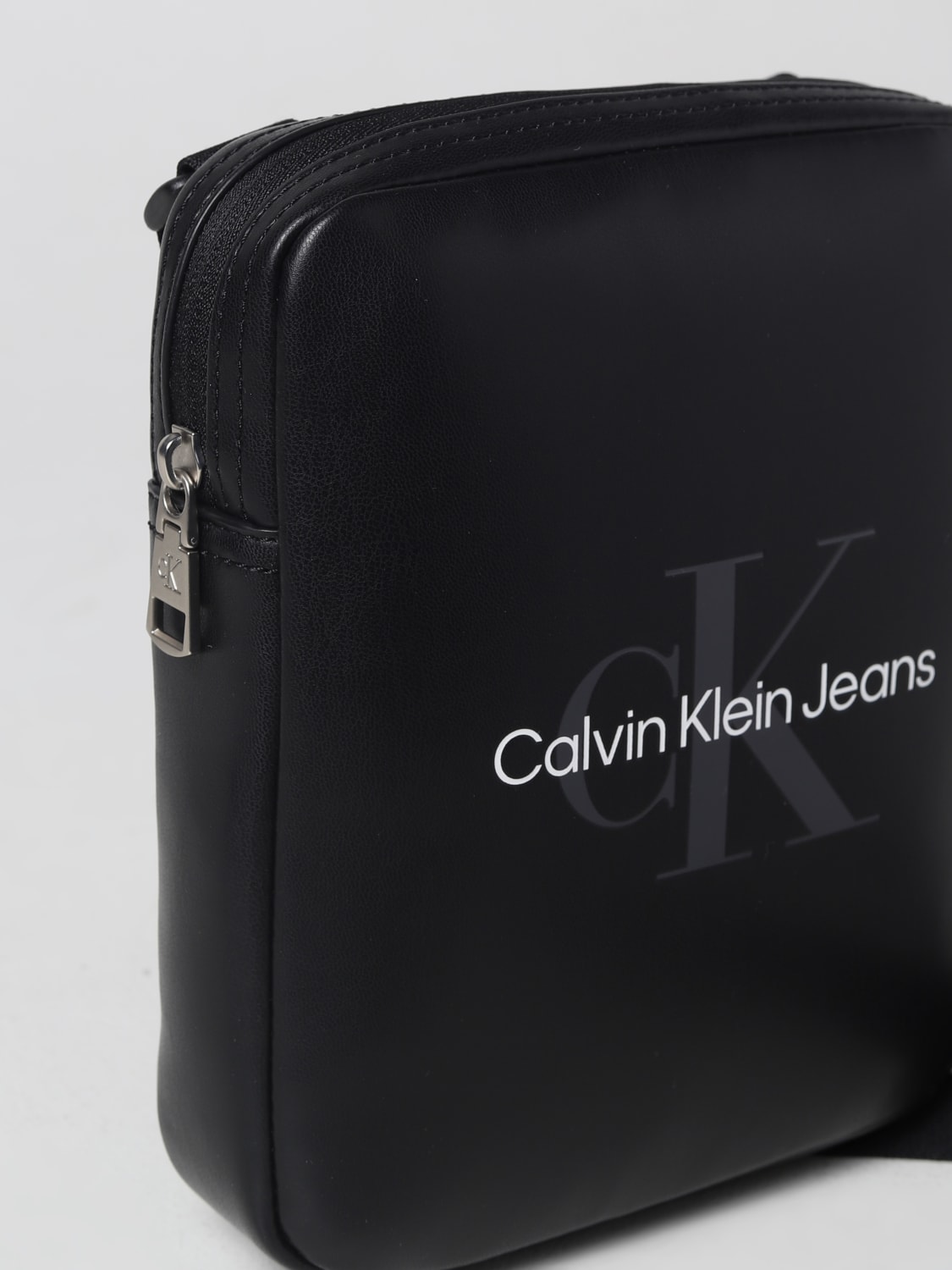 Calvin Klein Jeans monogram logo cross body bag in white
