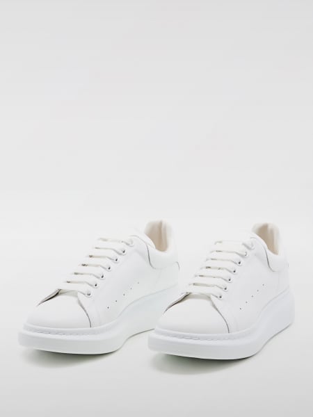 black and gold kids trainers