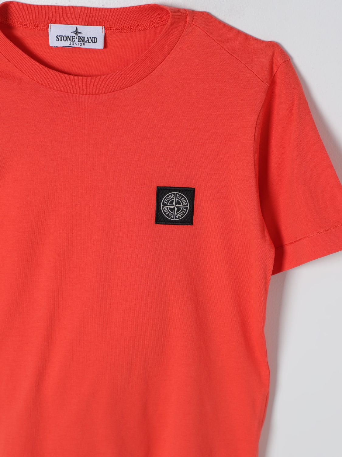 Orange stone island t shirt top