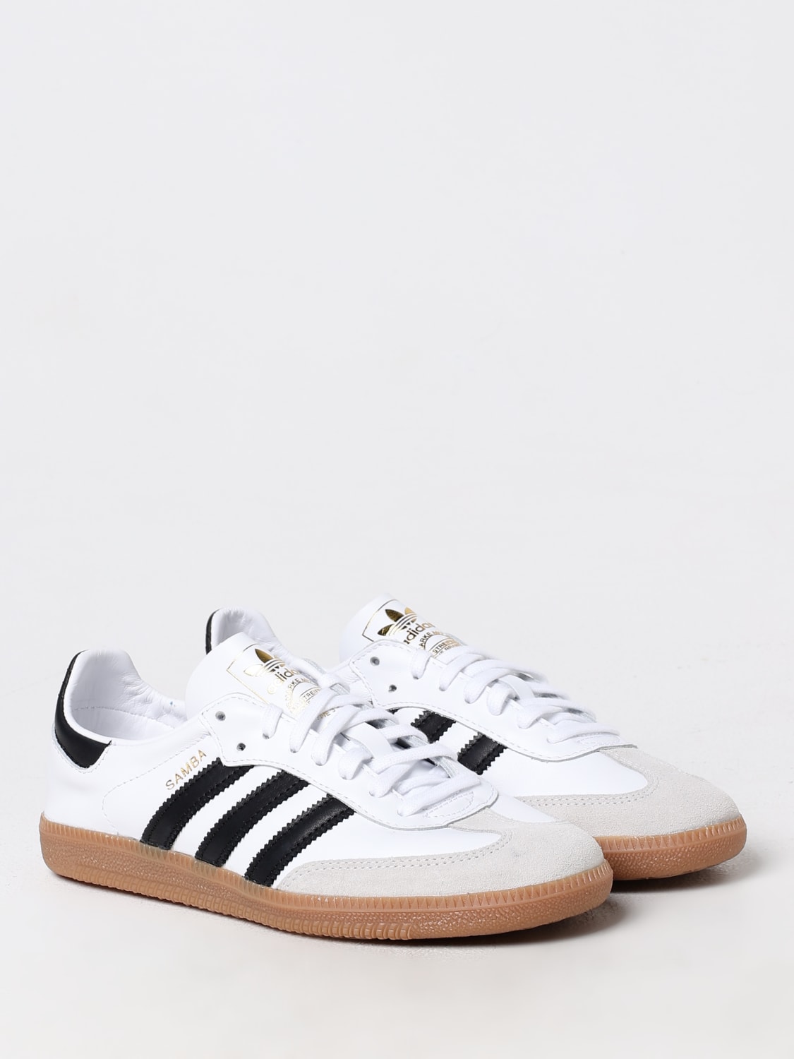 Adidas originals historia mujer top