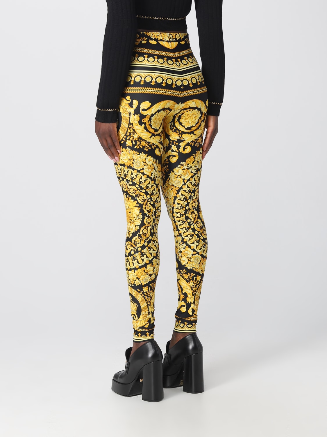 VERSACE Pantaloni Barocco in tessuto stretch Oro Pantalone Versace 10039001A04239 online su GIGLIO.COM