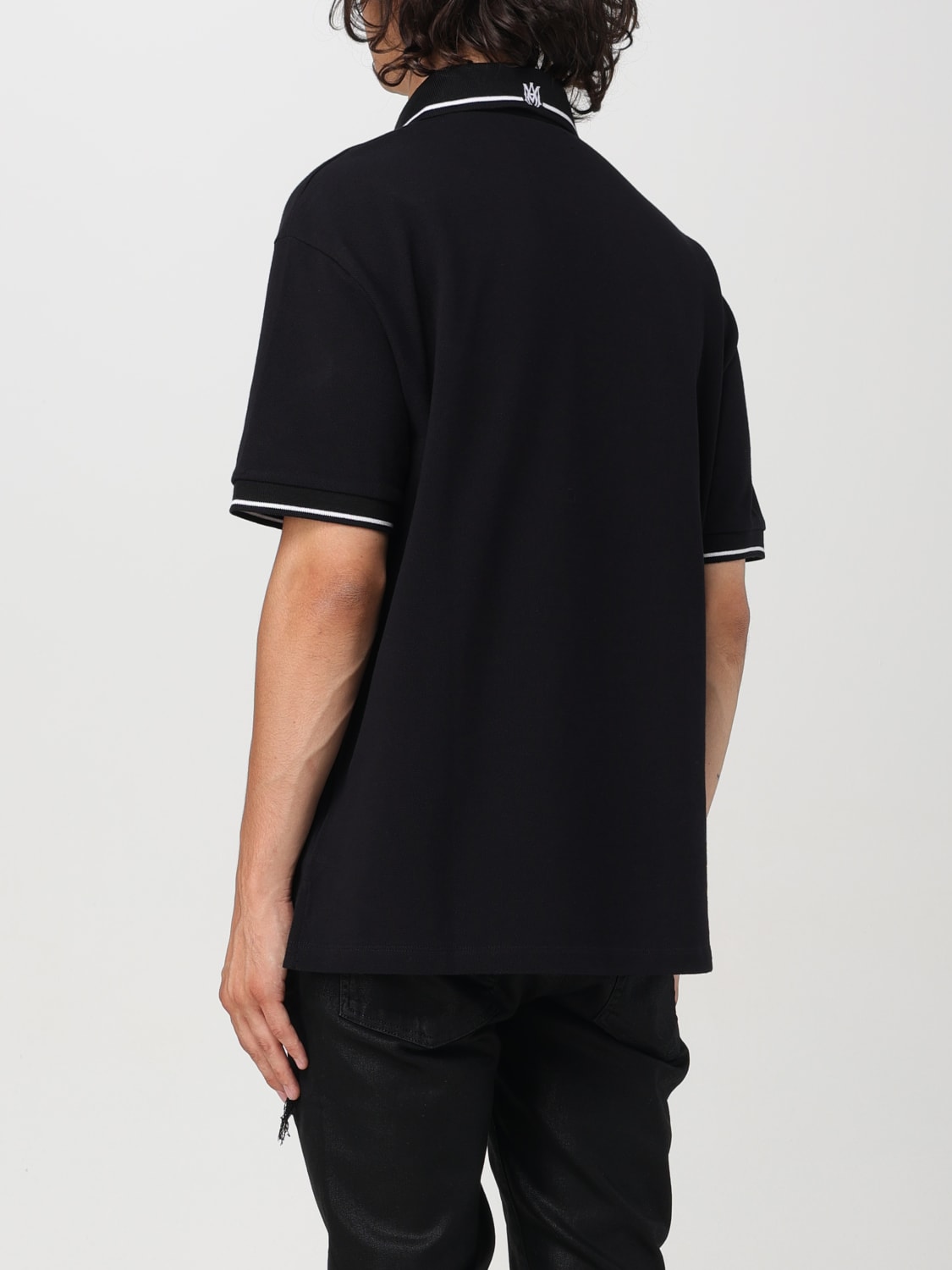 AMIRI ブラック ポロシャツ AMIRI ポロシャツ | ブラック | FARFETCH JP