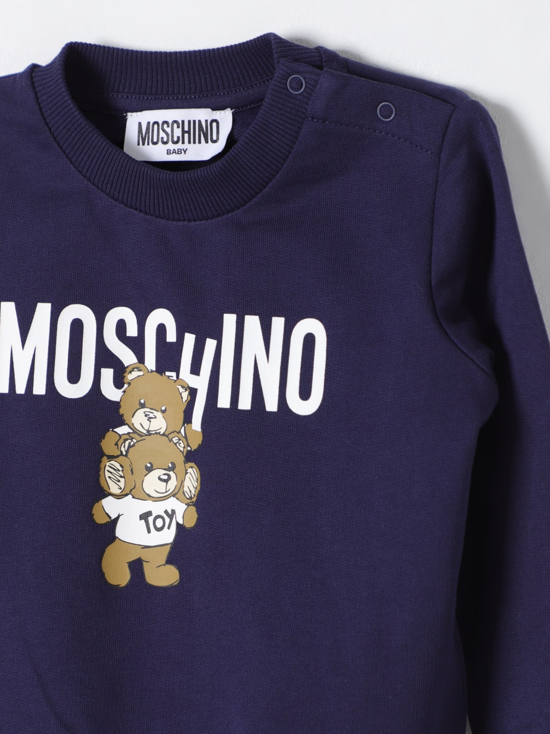 Blue moschino sweatshirt on sale