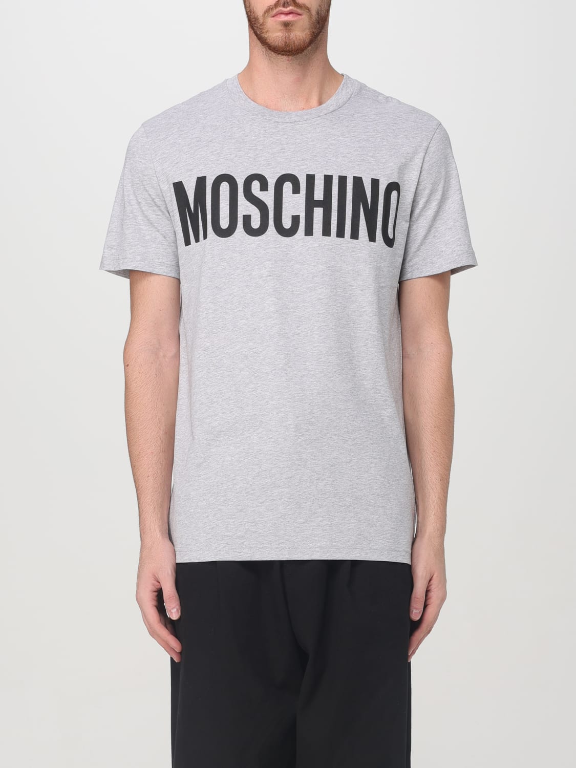 Giglio T-shirt Moschino Couture in cotone con stampa logo