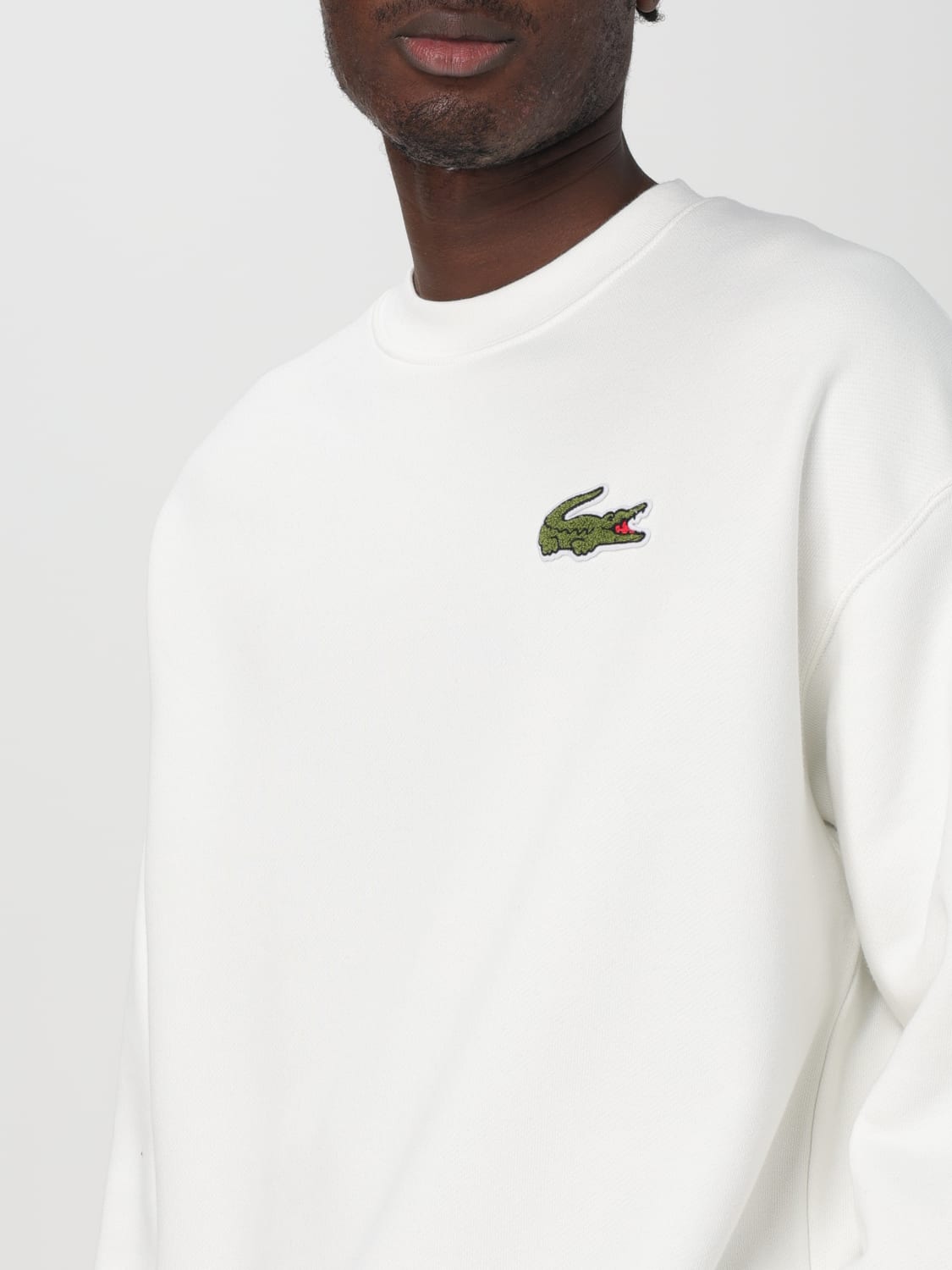 Pull blanc homme lacoste hotsell