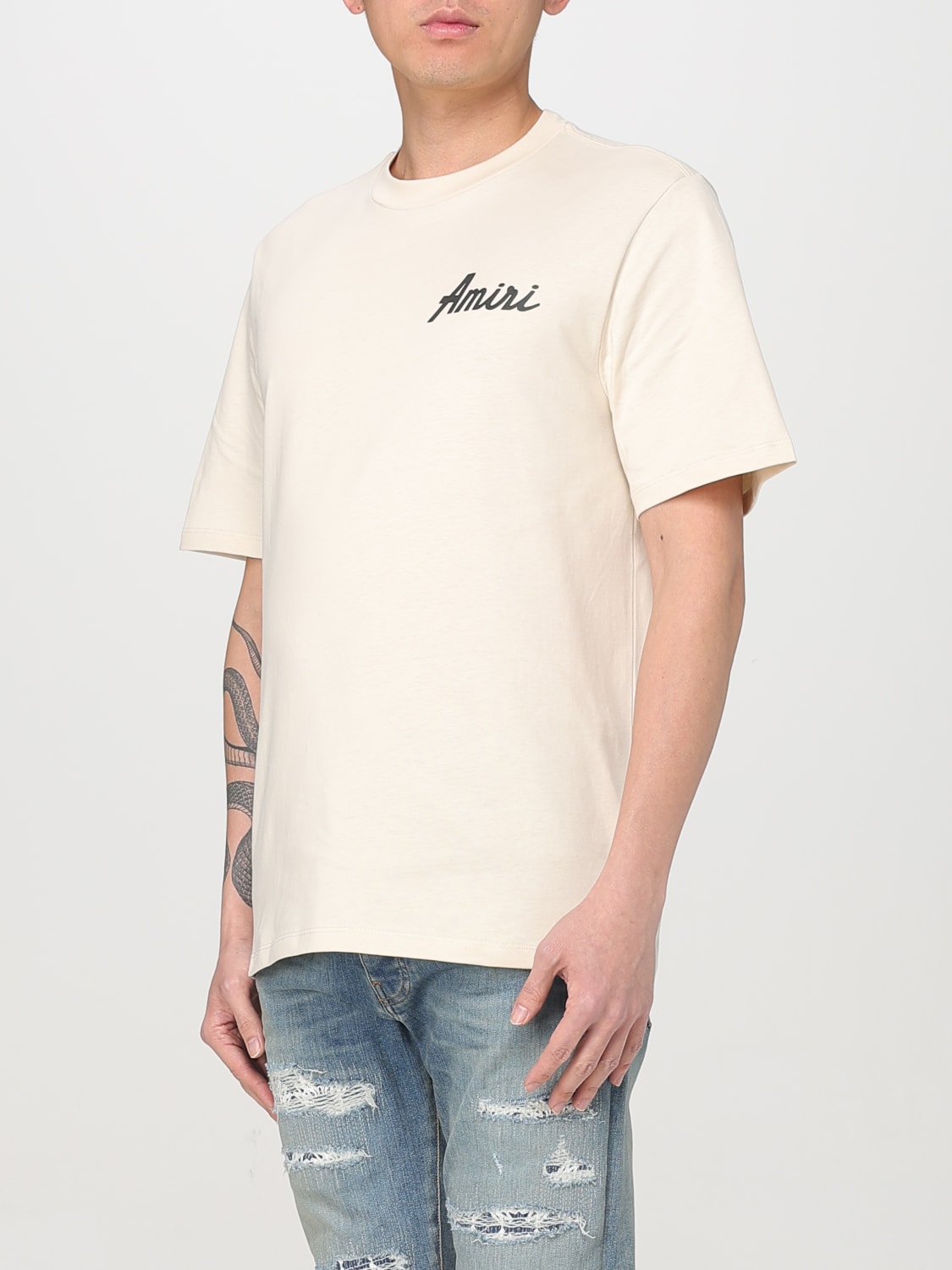 AMIRI：Tシャツ メンズ - ベージュ | GIGLIO.COMオンラインの