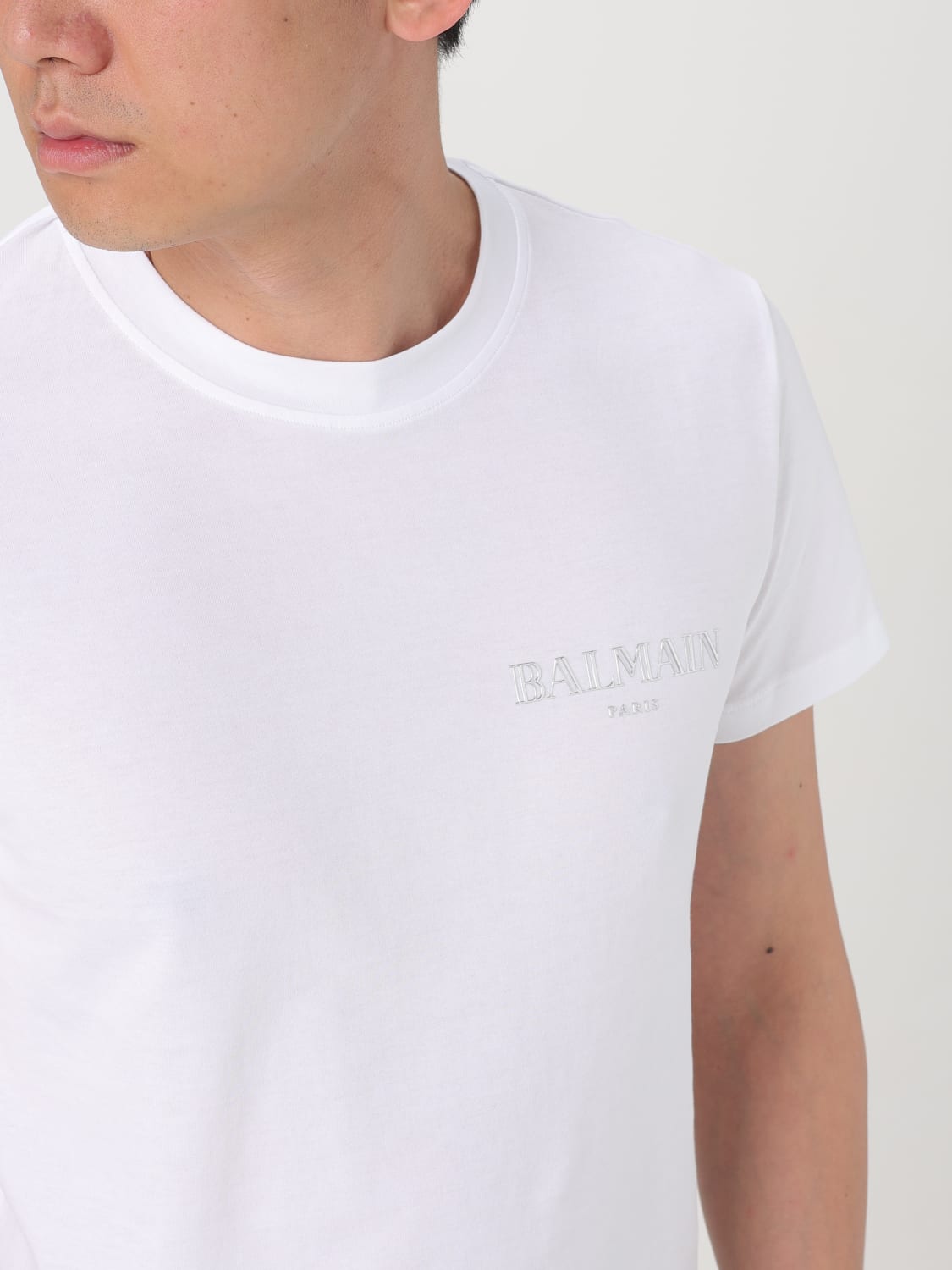 Tシャツ・カットソー BALMAIN Men T Shirts EH1EF000GD84 0HF White T-shirt with vintage gel Balmain logo - Men | BALMAIN