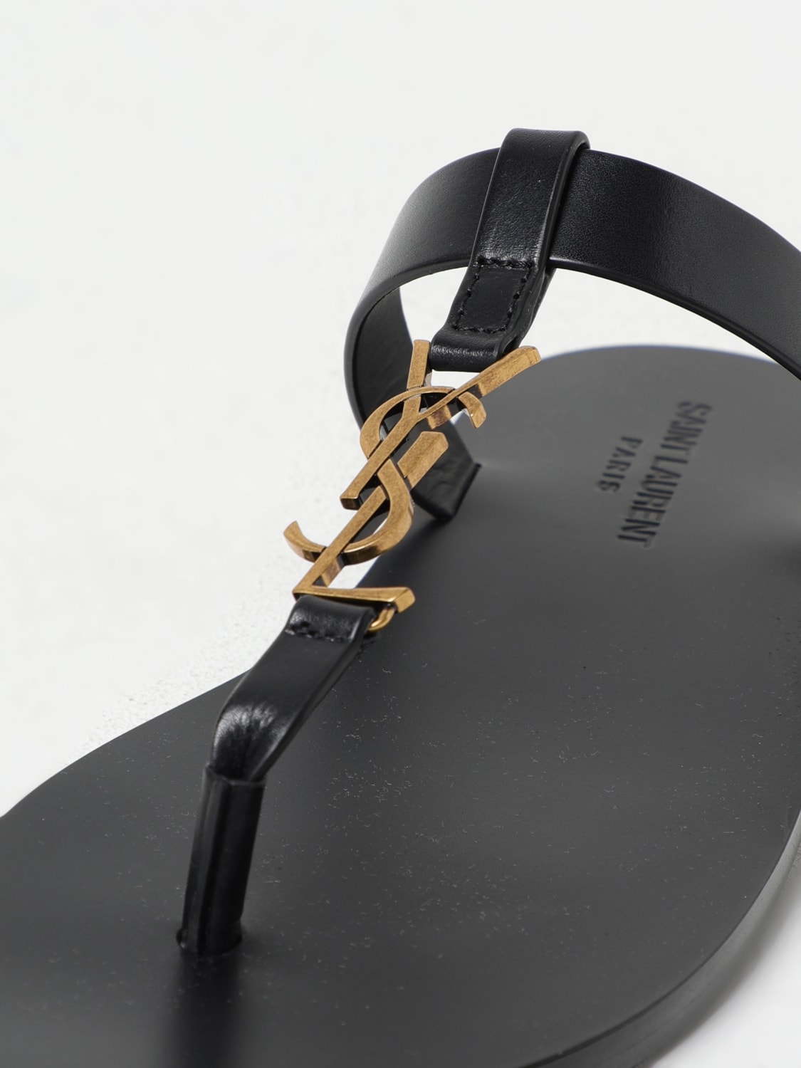 サンダル SAINT LAURENT Men Sandals 775806DWETT1000 BLACK CASSANDRE slides in smooth leather | Saint Laurent | YSL US