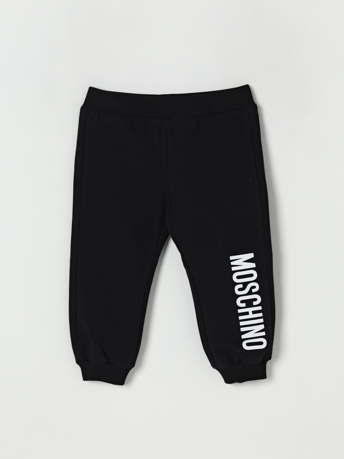 MOSCHINO PANTALONES: Pantalón niños Moschino, Negro - Img 1